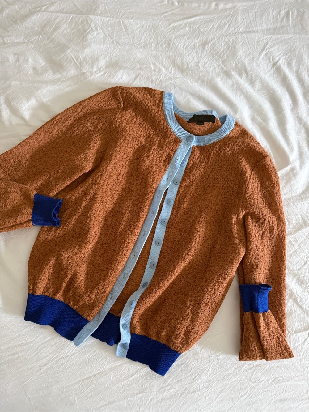 Zara Rust Cardigan with Light Blue Trim and Royal Blue Accents